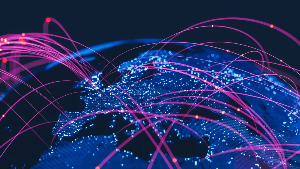 Global Communication Network - Filtronic PLC - Abstract metaverse globe with neon colored lights and networks.